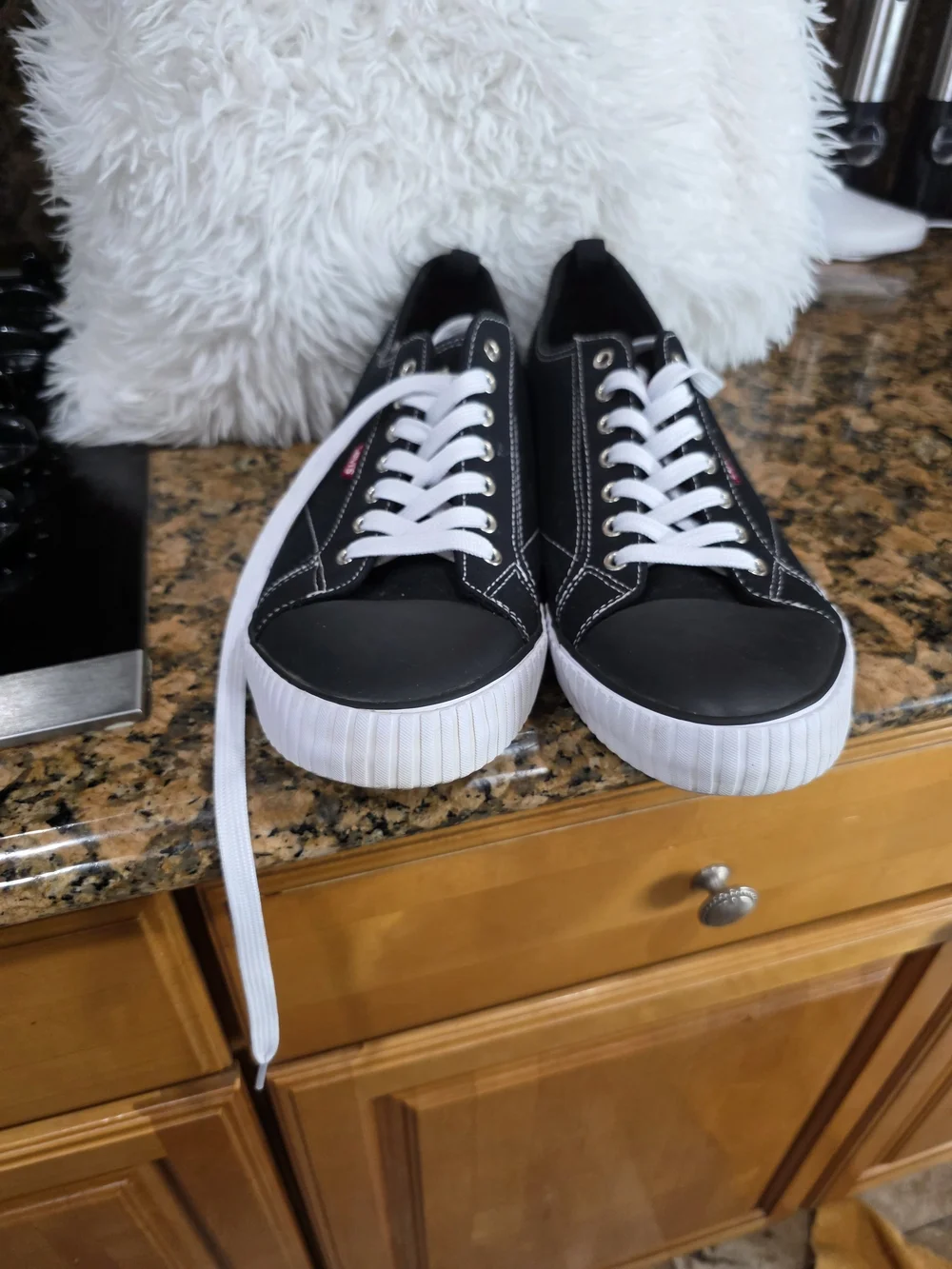 Levi's Men's Black Canvas Low-Top Sneakers with White Accents and Red Tab